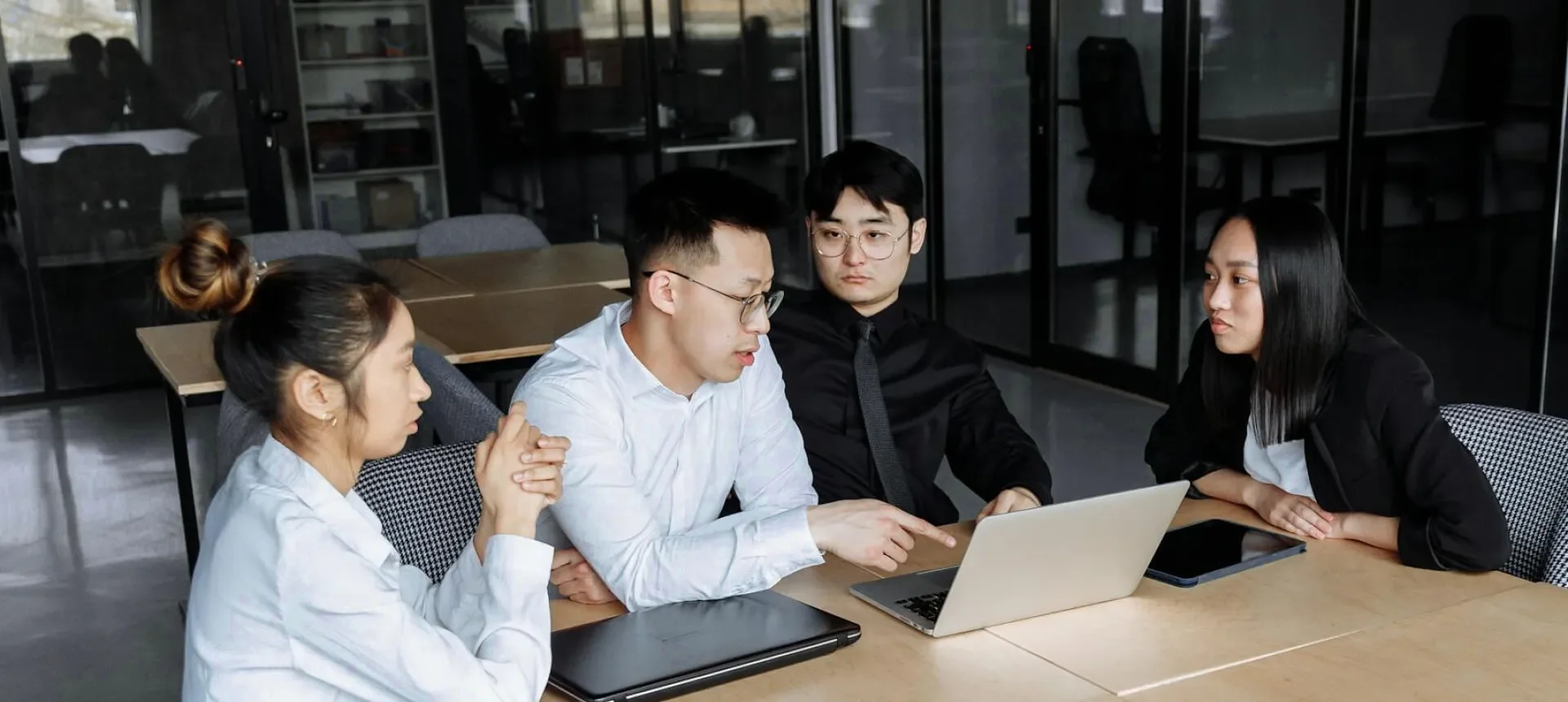 a group of people having a meeting